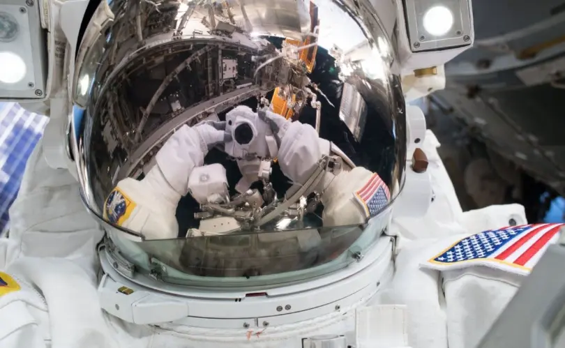 US Spacewalkers Feustel and Arnold complete EVA double