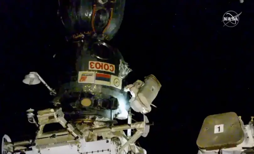 Russian EVA examines hole repair area on Soyuz MS-09