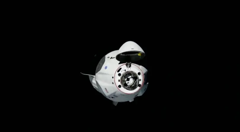 Dragon Endeavour Docks to the ISS, Bob and Doug Capture the Flag