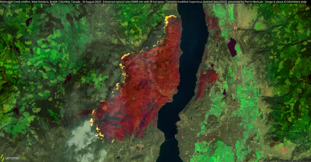 A Copernicus Sentinel view of the 2023 McDougall Creek wildfire near Okanagan Lake, illustrating how infrared-enhanced satellite imagery can reveal active fire fronts, smoke, and burned areas. Copernicus Sentinel-2 image,