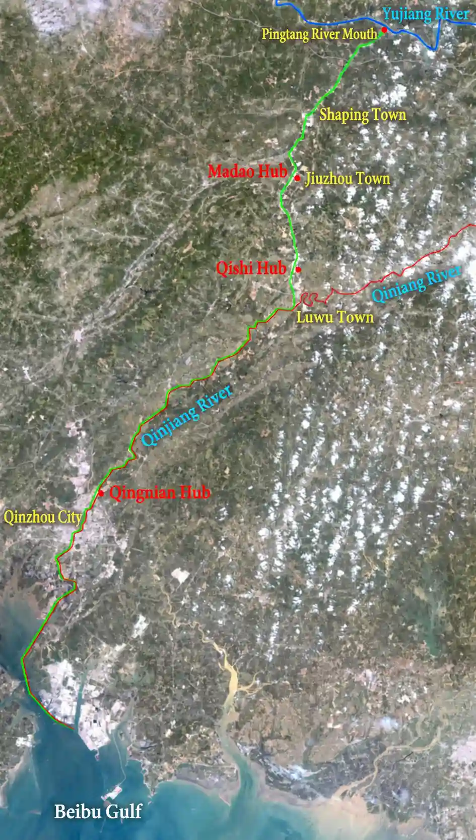 Satellite Image of the Pinglu Canal. The red line marks the Qinjiang River, the blue line marks the Yujiang River, a tributary of the Xijiang River, and the green line marks the Pinglu Canal. The canal connects the Xijiang and Qinjiang river systems.