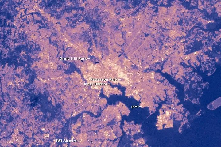 Why Satellite Surface Temperature Differs from Air Temperature
